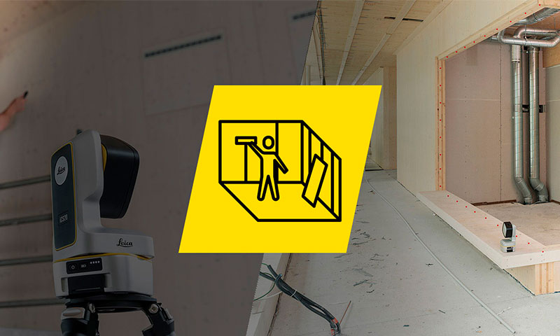 Oprogramowanie Leica iCON trades do Wykańczania Wnętrz na czarnym tablecie Leica iCON na placu budowy przed ocieplonym drewnianym dachem.
